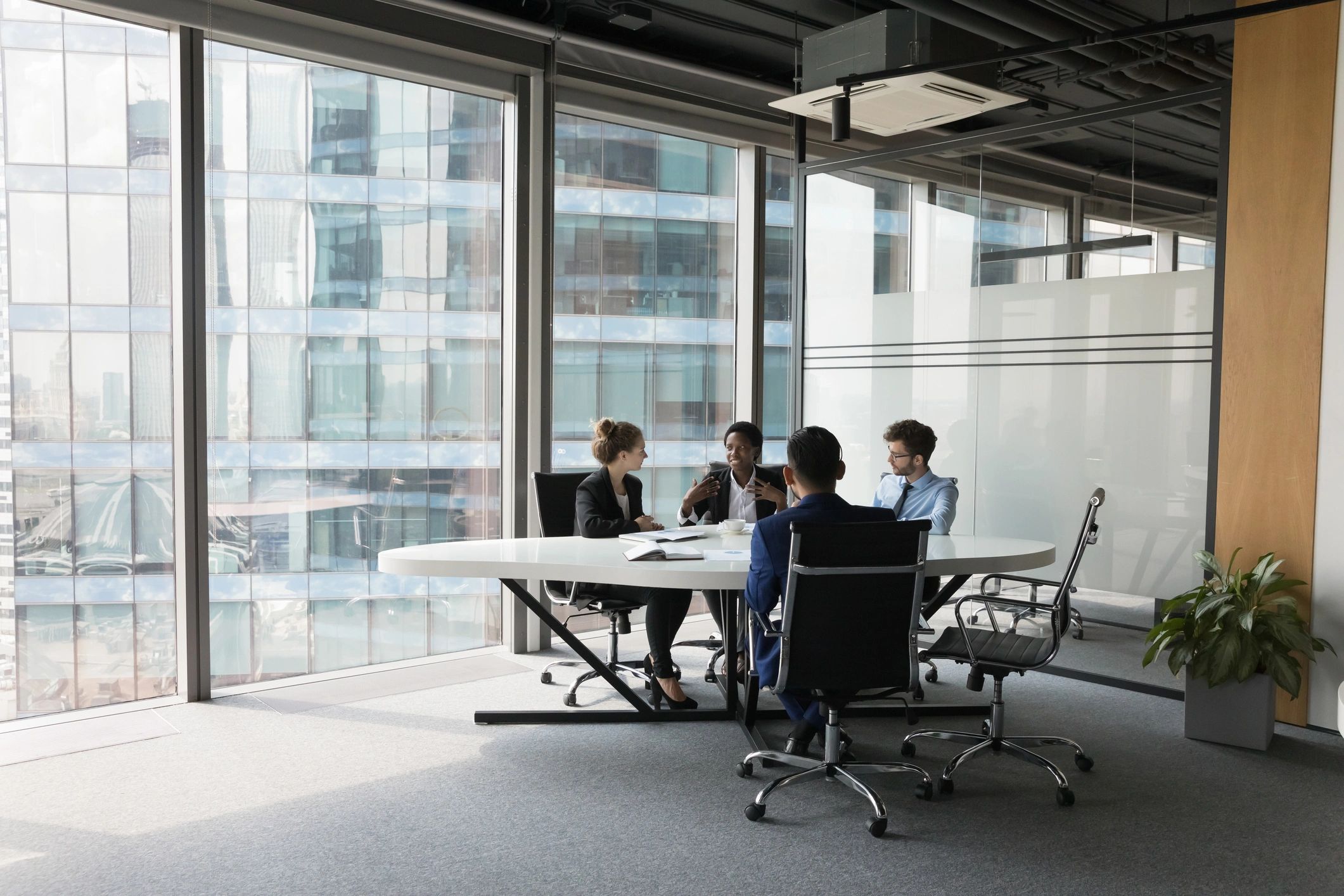 Professional legal team meeting in a modern office