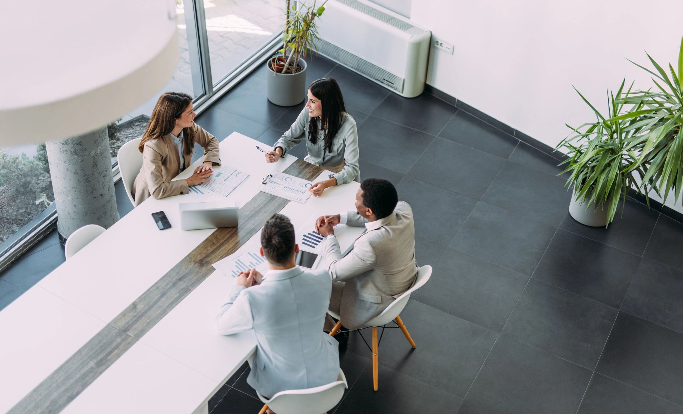 Law firm team collaborating around a conference table