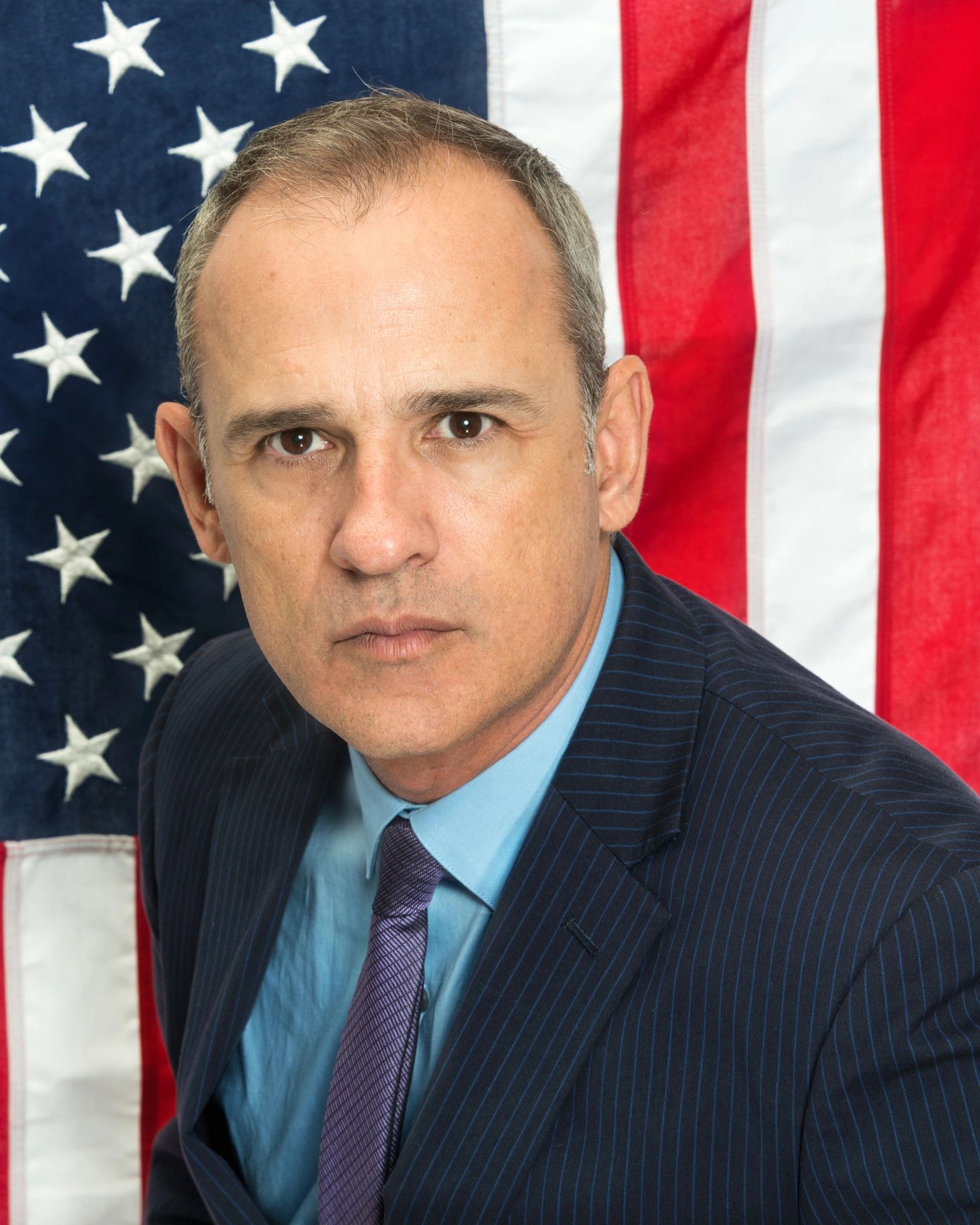 Professional portrait of a commercial law attorney